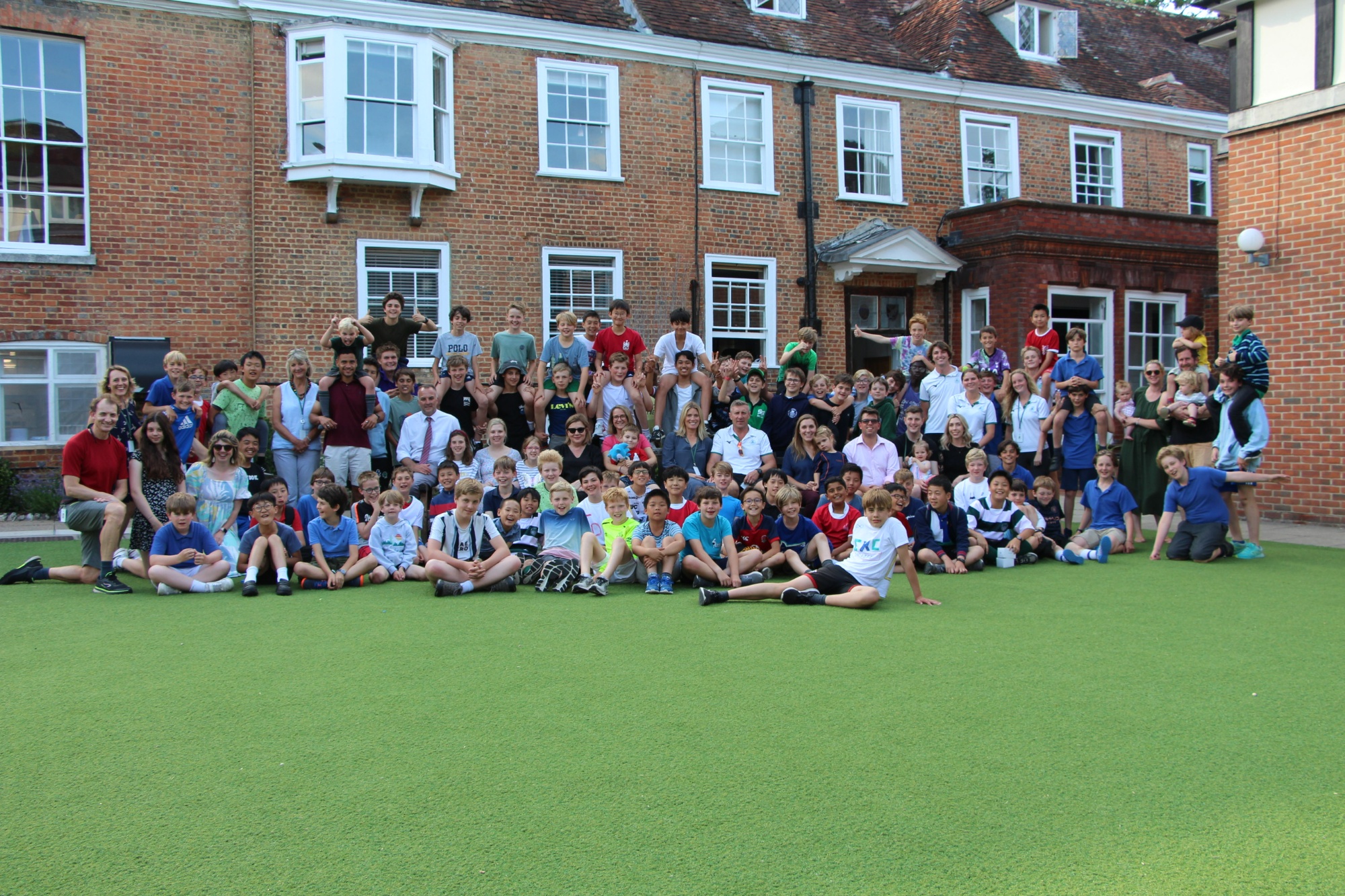 Group boarding community photo on Quad
