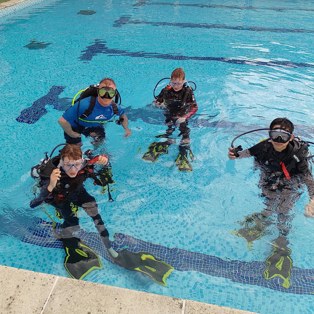 Boys at pool in Diving Commoner