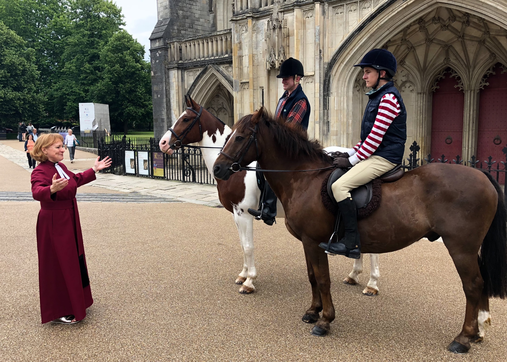 Riding for charity, The Dean blesses a Leaver's project.