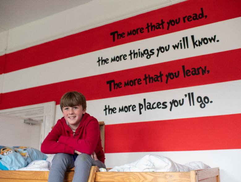Boy in themed dorm